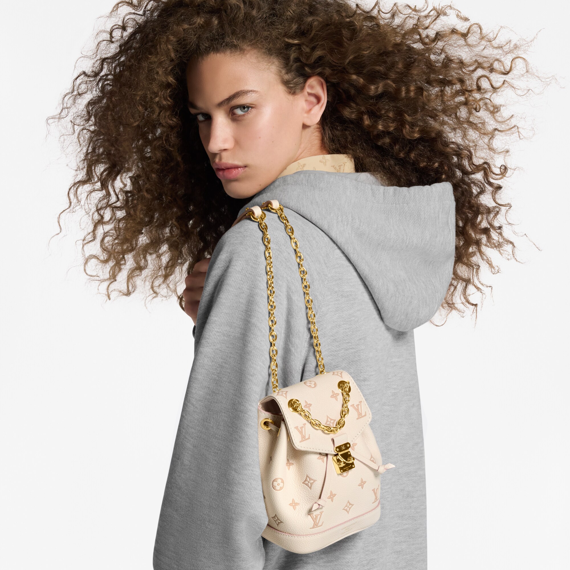 Cuir Monogram Empreinte Bicolore Petite Maroquinerie Portefeuilles sur Chaîne et Micro Sac Sac à dos Nano Noé | Louis Vuitton ® (Zoom produit)