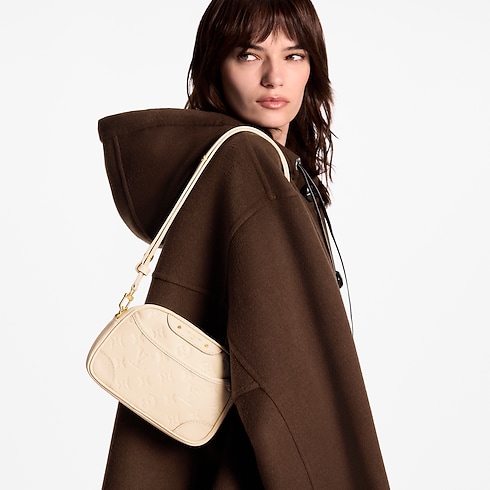 Monogram Empreinte Leather Small Leather Goods Wallets on Chain and Nano Bags Tiny Camera Bag | Louis Vuitton ® (Product zoom)